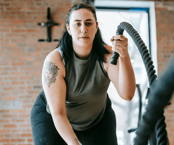 woman training with ropes
